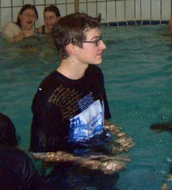 black T-shirt in pool